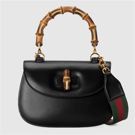 gucci bamboo 1947 medium top handle bag|Gucci monogram bamboo handle bag.